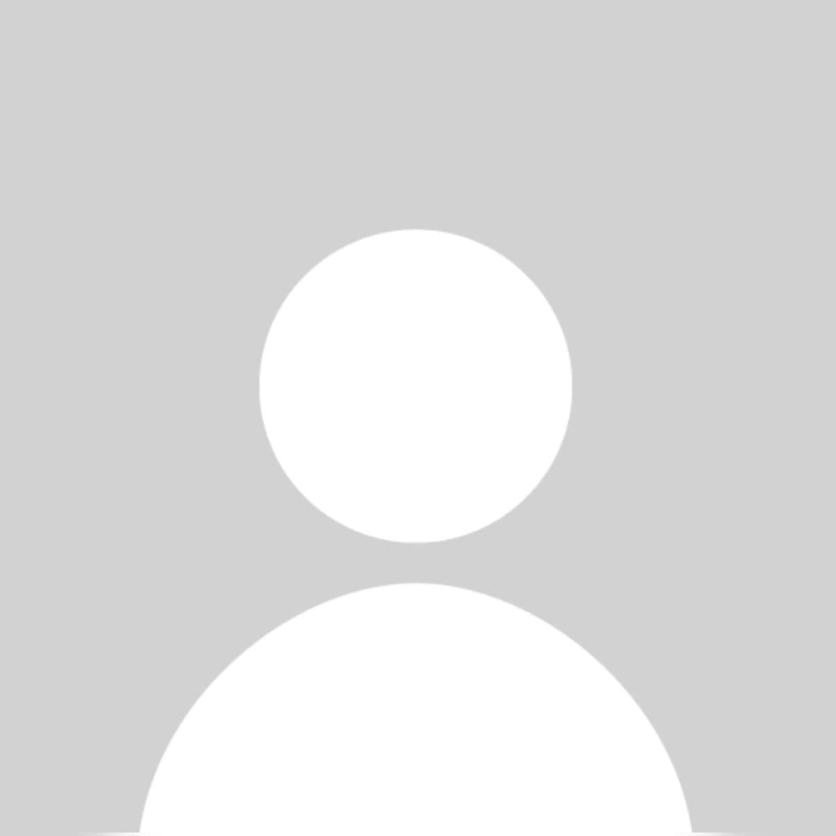 Icono de perfil de usuario genérico con silueta blanca sobre un fondo gris neutro.